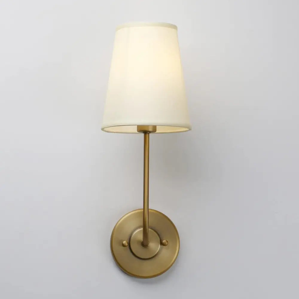 WeaveGlow – Modern Wall Lamp Featuring Woven Metal and Soft Fabric