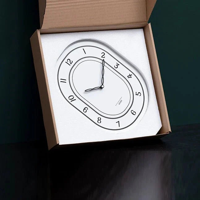 Silent Oval Wall Clock with Roman Numerals Design