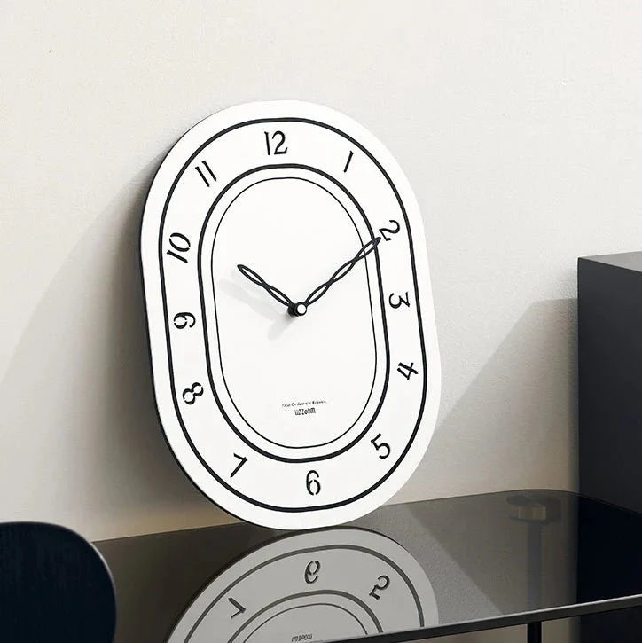 Silent Oval Wall Clock with Roman Numerals Design