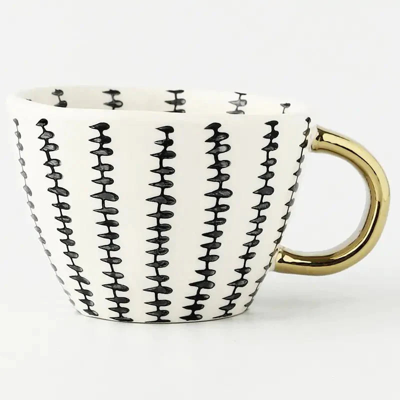 Hand‑Painted Ceramic Mug with Gold Handle