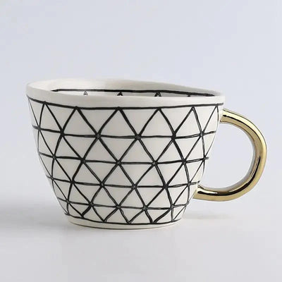 Hand‑Painted Ceramic Mug with Gold Handle