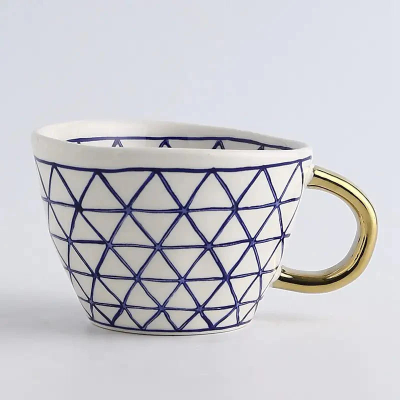 Hand‑Painted Ceramic Mug with Gold Handle