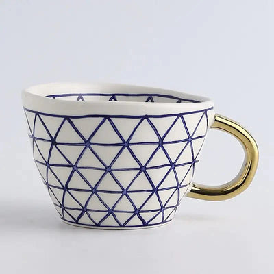 Hand‑Painted Ceramic Mug with Gold Handle